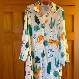 Never worn. Can be use as beach wear or a long shirt over leggings